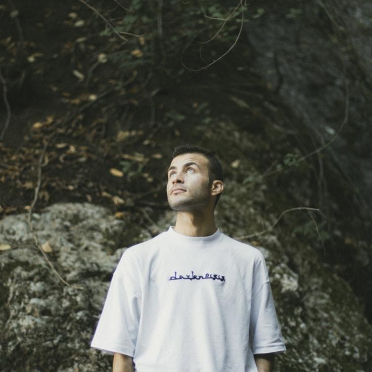 Kaveri Mehta, Lead Design Curator at ModernAtlasWorks, reviewing corporate floral arrangements